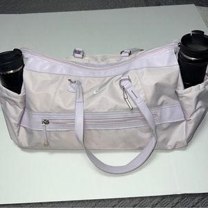 Nike large lavender gym/travel bag with 7 pockets/zippers